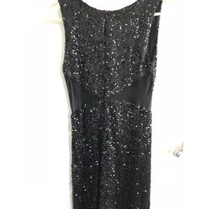 Black sequin dress with mesh cutouts